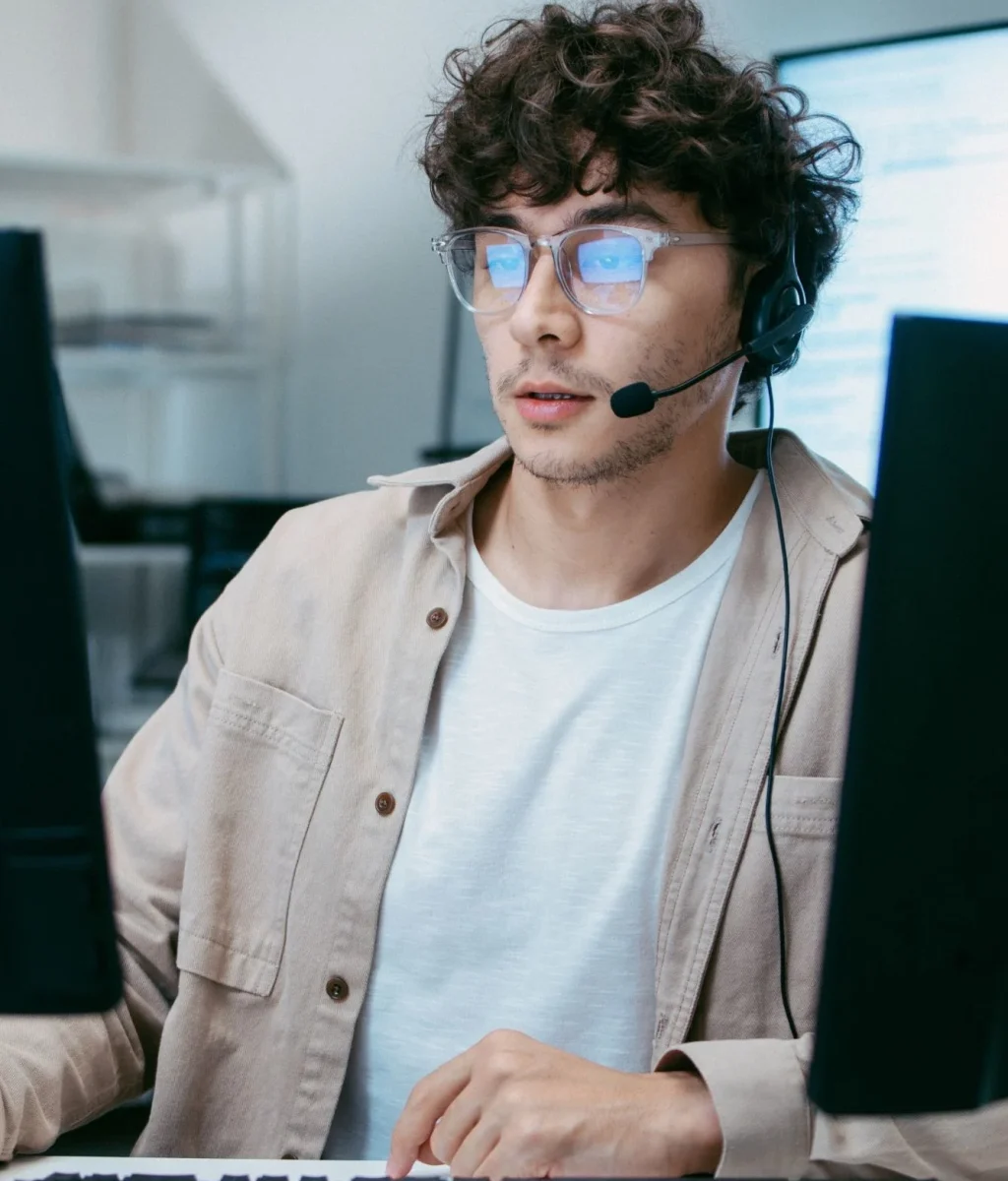 Professional contact center agents working on computer systems to provide inbound and outbound business solutions.